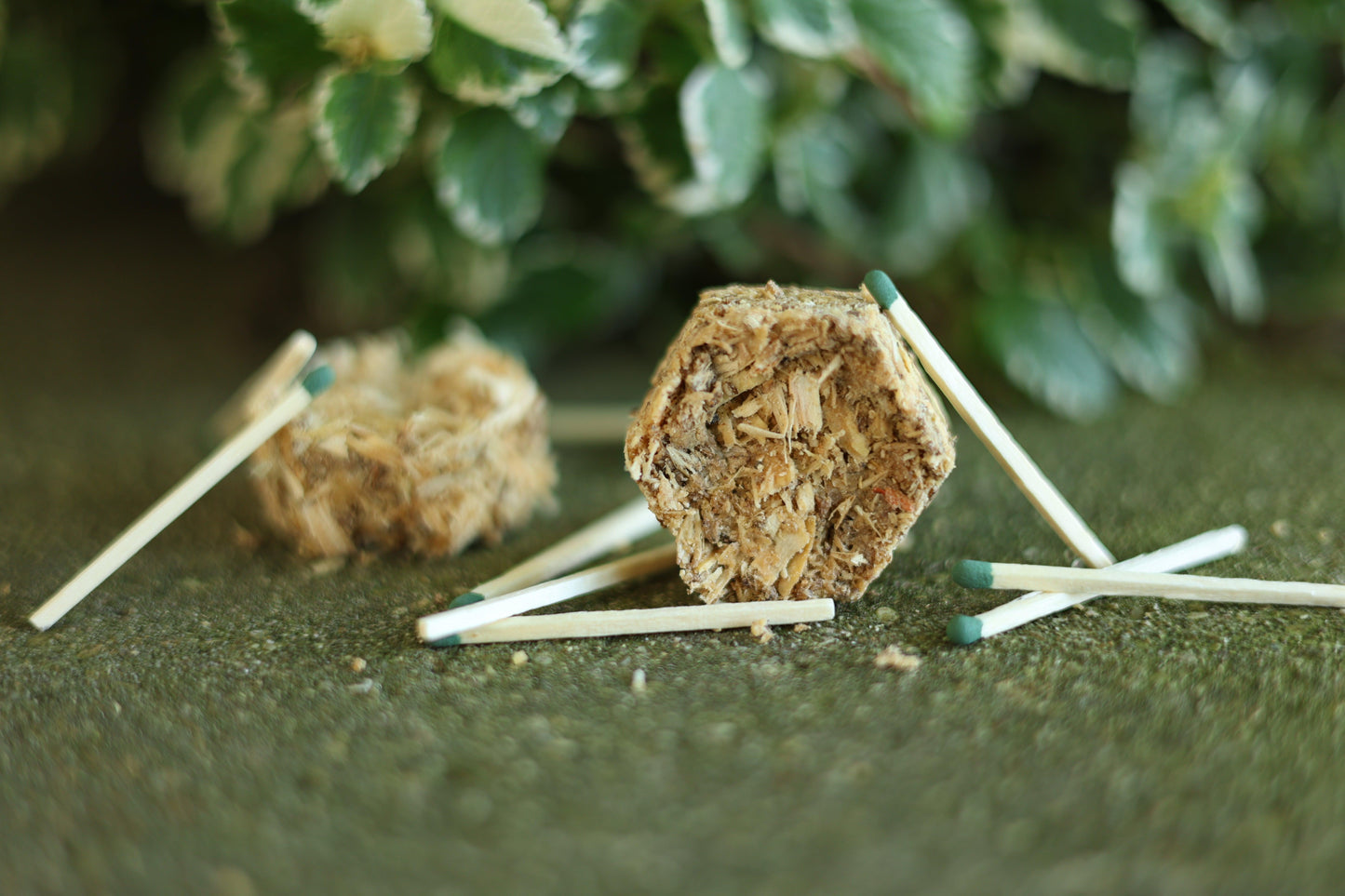 Eco-friendly hexagon beeswax fire starters showcasing sustainable materials, including pine shavings, sawdust, and beeswax, ideal for eco-conscious customers.