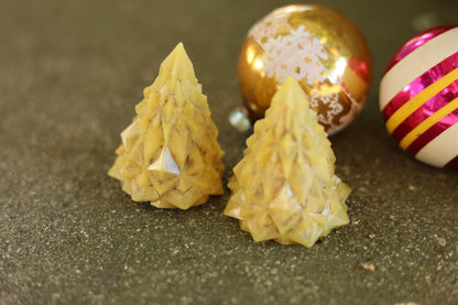 Handcrafted eco-friendly geometric Christmas tree fire starter made from pine shavings, sawdust, spent grain, and beeswax for sustainable fire-starting which also doubles as Christmas decor or holiday decor.