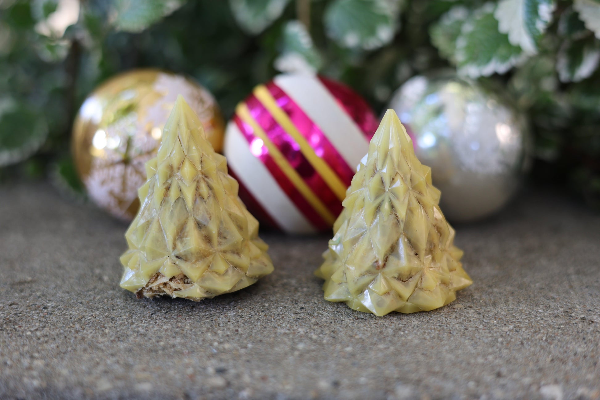 Geometric natural beeswax Christmas tree fire starter showcasing sustainable materials, including pine shavings, sawdust, and beeswax, ideal for eco-conscious customers.